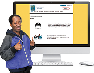 A man standing in front of a computer screen with an easy english website. He is giving a thumbs up. 